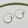 Pendientes circulares de lujo, ligeros y de alta gama, de Niche Design Sense.