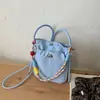 Bolso pequeño súper popular transfronterizo para mujer, nuevo bolso de mano de moda ligero para otoño 2026, bolso de hombro y bandolera para teléfono