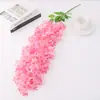 Glicina Artificial al por Mayor Lila Ramo Pequeño Colgante de Pared Flores Artificiales Fondo de Boda Decoración Floral Ratán