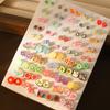 Pendientes de fruta con forma de rebanada de explosión transfronteriza (50 pares) con diseño de flores de plástico y letras de animales, pendientes de dibujos animados japoneses para mujer.