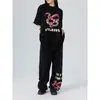 Calça Feminina Solta Casual Fina Estilo Hip-Hop Streetwear Americano 2024 Novo Design de Nicho Calça de Moletom Estampada
