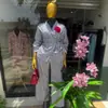 Ropa Femenina Transfronteriza Europea y Americana Verano 2026 Nueva Moda Casual Camisa de Rayas con Corbata Pantalones Largos de Cintura Alta Conjunto Casual