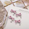 Celebridad de Internet Nueva Joyería para Uñas Corazón Cristal Diamante Super Brillante Circonita Colgante de Lazo Luz de Estrella Metal Joyería de Diamantes para Uñas