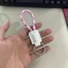Llavero de cuerda tejida a mano de cuero para coche personalidad creativo colgante de llave patrón de texto imprimible venta al por mayor de fábrica