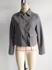 Nueva chaqueta de comercio exterior transfronterizo estilo europeo y americano con cuello de solapa, tela suave bicolor, decoración de hebilla metálica, bolsillos de parche grandes, ajuste holgado casual vintage