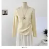 Camiseta de punto de manga larga con cuello redondo de estilo coreano, tirante plisado asimétrico para mujer, suéter suave y ceroso con abertura para mujer, invierno