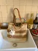 Bolsa Grande de Mão Feminina de Ombro Único Design de Nicho Bolsa de Praia para Férias na Praia Bolsa Tote Tecida de Palha para o Dia a Dia