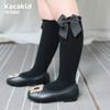 Calcetines de tubo con lazo para niña, calcetín coreano de algodón de color liso para bebé, venta al por mayor, otoño