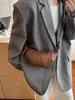 Bolso croissant vintage de nicho 2026 verano nuevo estilo ins para el trabajo bolso de hombro para teléfono bolso cruzado bolso de albóndiga moderno