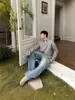 Suéter de punto trenzado con media cremallera estilo americano directo de fábrica para hombre y mujer, base holgada y casual, nuevo artículo de otoño 2026