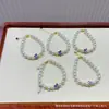 Nuevo Pulsera de Perlas con Diseño de Mariposa Esmaltada Fresco y Dulce, Elegante y Sencillo, Joyería Versátil Estilo Ins, Venta Directa de Fábrica