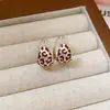 Pendientes Redondos con Estampado de Leopardo Transfronterizos Europeos y Americanos Nicho Lujo Ligero Pendientes de Gama Alta Personalizados Versátiles Pendientes de Temperamento Venta al por Mayor Mujeres