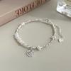 Pulsera de plata rota con perlas del personaje Ping An Fu de un año, diseño de nicho femenino, pulsera de alta gama para amigas, nueva moda de lujo ligero