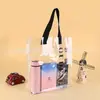 Bolso de mano transparente de PVC con estampado qlogo estilo ins portátil regalo bolsa de plástico bolsa de regalo fabricantes