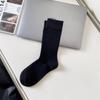 Calcetines nuevos de color liso sin hueso, hasta media pantorrilla, versátiles y exquisitos, de estilo japonés, cómodos y transpirables.