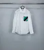 Camisa de Manga Larga a Rayas de Bolsillo Nuevo Color Primavera Temprana Directo de Fábrica Tb Unisex Casual Cómoda