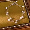 Pulsera de bola de diamante con cuentas de doble capa, pulsera de nicho de lujo ligero de alta gama, joyería de moda elegante y única para mujeres al por mayor