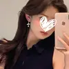 Pendientes de Aro Súper Brillantes para Mujer 2025 Nuevo Estilo Caliente Pendientes de Estilo Frío de Gama Alta Pendientes Sencillos de Diamante