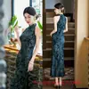 Cheongsam largo de terciopelo negro estilo chino, cola de pez, sin hombros, cuello halter, nuevo modelo de principios de otoño 2026, corte ajustado y favorecedor, adecuado para el uso diario