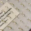 Pegatinas para Uñas con Patrón de Hormiga Pegatinas para Uñas con Lazo Francés Decoraciones para Uñas Estilo Chanel Fábrica Directa Venta al por Mayor Yt8473