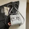 Mochila Fashionável Estilo Coreano com Laço para Mulheres 2026 Novo Modelo de Verão Bolsa de Ombro Casual Simples de Alto Valor
