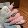 Anillo con hebilla de herradura de jadeíta natural al por mayor del fabricante para Xiaohongshu con incrustación de plata s925, diseño fresco y simple