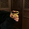Pin de la Suerte Naranja de Hangzhou Lingyin para Riqueza Instantánea, Colgante Broche de Bebé Tejido para Bendición y Seguridad, Productos Culturales y Creativos de Zonas Pintorescas