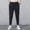 Pantalones Deportivos para Hombre 2024 Nuevo Verano Ajustados Versátiles Casuales Estilo Coreano Modernos Ropa de Trabajo Holgados con Tobillo