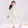 Conjunto de Pijama Redondo para Niños Dos Piezas Estilo Otoño/Invierno Unisex Suave Pegajoso Agradable a la Piel Color Sólido Versátil Cálido Conjunto para Estar en Casa