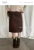 T-PLATAFORMA2026 Otoño Retro Gamuza Hebilla Cuadrada Cinturón Elegante Gama Alta Falda Midi Línea A 26192