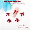 Mini accesorios de resina para uñas, con lazo hueco de cinta tridimensional de color rojo vino, venta al por mayor