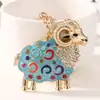 Novo chaveiro de ovelha com detalhes em strass e design de gota de óleo, design do signo de ovelha do zodíaco chinês, pingente para bolsa feminina, chaveiro de carro, pequeno presente