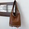 Bolso Cruzado Retro Casual para Hombro Moda Europea y Americana Primavera 2026 Simple y Elegante Gran Capacidad Bolso Cubo de Moda