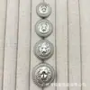Botones metálicos de cabeza de león estilo británico para trajes, abrigos de punto de lana, botones decorativos simples y versátiles cosidos a mano