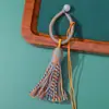 Anillo hebilla de borla de hilo de algodón estilo Xizang colorido, producto semiacabado hecho a mano para colgar en bolsos, colgar en el coche, colgante y accesorio, al por mayor en stock
