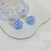 Pendientes de camelia azul Klein diseño de temperamento francés de verano pendientes nuevos únicos pendientes de perla clip para oreja