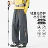 Calças retas masculinas estilo workwear para atividades ao ar livre, nova coleção primavera/outono 2026, com cordão, corte solto e design conversível para uso casual