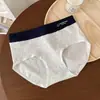 5440 # Algodón colorido Clase A estilo deportivo bloques de color tiro medio sin costuras cómodas 10A triángulo antibacteriano en la entrepierna calzones para niñas