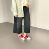 Bestseller de alto valor estilo coreano Esquema de cores vermelho e branco Bestseller de 2026 Tênis de treino alemães Couro macio no forro Tênis de treino alemães super quentes Feminino