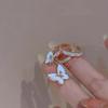 Pendientes de mariposa blanca de súper hada 2023, pendientes sencillos de esmalte frío para mujer, pendientes de nicho de celebridades de Internet con temperamento de Corea del Sur