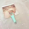 Mini Cortauñas de Dibujos Animados para Uñas de Casa Color Macarrón Lindo Estudiante Portátil Anti-salpicaduras Pequeños Cortauñas