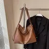 Bolsa Feminina de Grande Capacidade 2025 Novo Estilo Bolsa de Ombro Maillard Mochila Versátil Retrô Bolsa Tote Texturizada para o Dia a Dia
