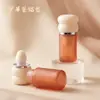 Tubo de brillo de labios translúcido moldeado por inyección cabezal de cepillo grande material de empaque personalizado maquillaje lápiz labial brillo de labios maquillaje HY-5506-1