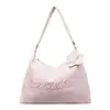 Bolsa Tote de Lona Casual para Mulheres 2026 Novo Estilo Coreano Bolsa de Ombro de Grande Capacidade para Estudantes Indo para a Aula Bolsa Transversal