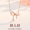 Colar de coração com laço de diamantes cintilantes em prata de lei S925, um design leve e moderno, versátil para vários looks, corrente para clavícula, pingente de pedra olho de gato, atacado