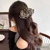 Acessórios de cabelo elegantes e sofisticados: grampos de cabelo para dar volume, presilhas de garra, presilhas verticais, presilhas de laço, presilhas banana, presilhas torcidas doces e estilosas