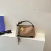 Bolsa de ombro transfronteiriça 2026 estilo coreano retrô, retalhos de camurça, blocos de cor, para usar sob o braço, uma bolsa de ombro nicho e sofisticada