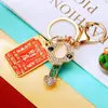 Chaveiro de Carro Sinal de Dinheiro da Sorte Pingente para Bolsa Feminina Argola de Chaveiro de Metal com Strass Pequeno Presente Atacado