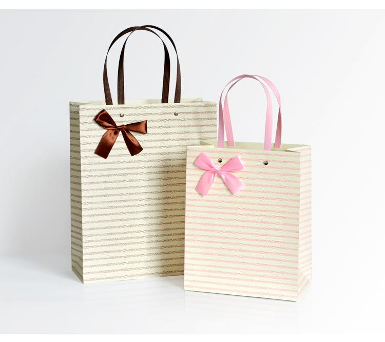 蝴蝶结手提袋_03