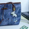 Colgante Decorativo para Bolso de Piel Estampada de Dibujos Animados Huayang con Borla, Llavero, Personalizable, Versátil, de Nicho